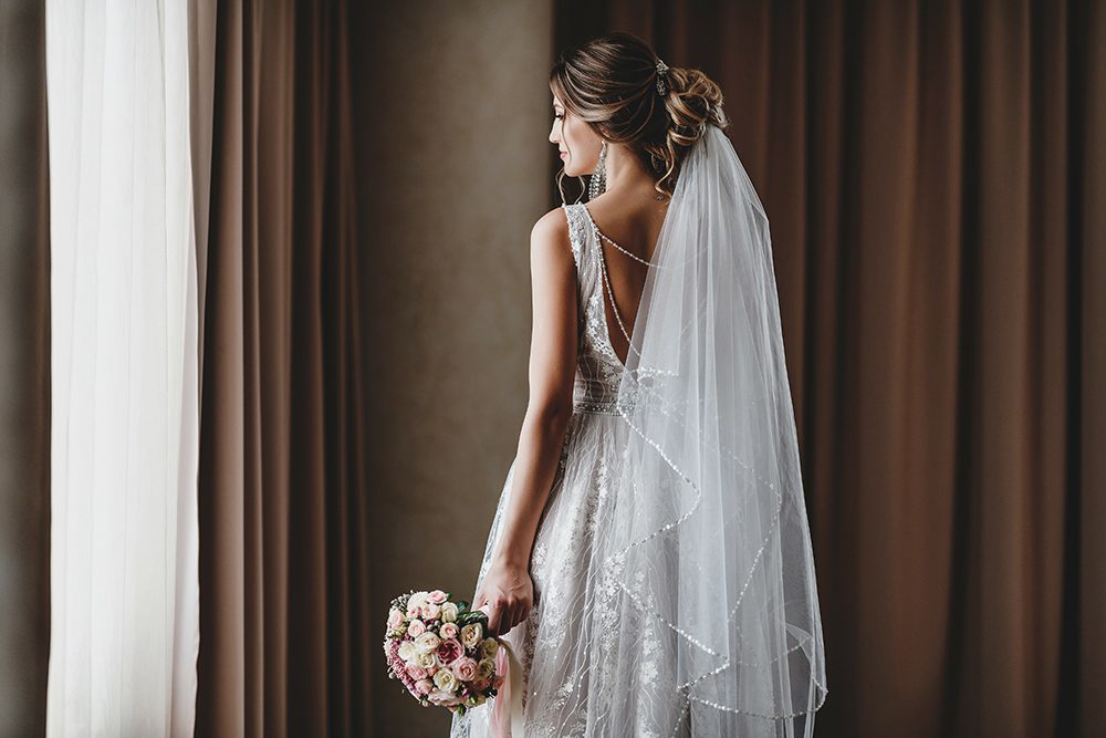 Gorgeous bride in a beautiful dress. Morning newlyweds.